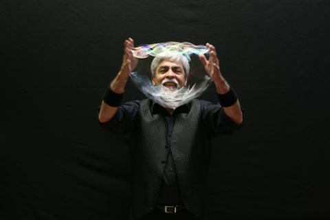 Ben's Bubble Show Promo Image, man holding bubble