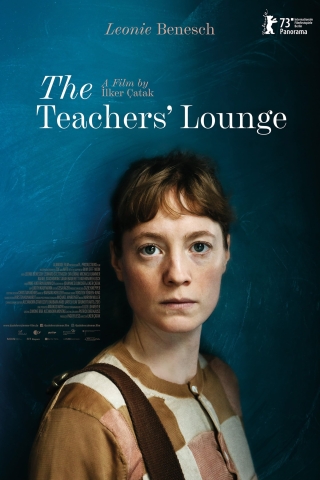 Movie poster for The Teachers' Lounge. Image is a young white woman with brown hair standing in front of a blue background.